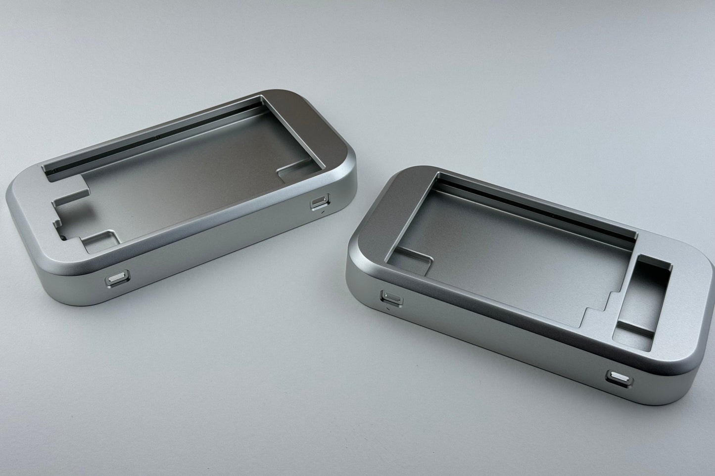 Back view of a closed silver Hall effect split keyboard, ortholinear layout for gaming