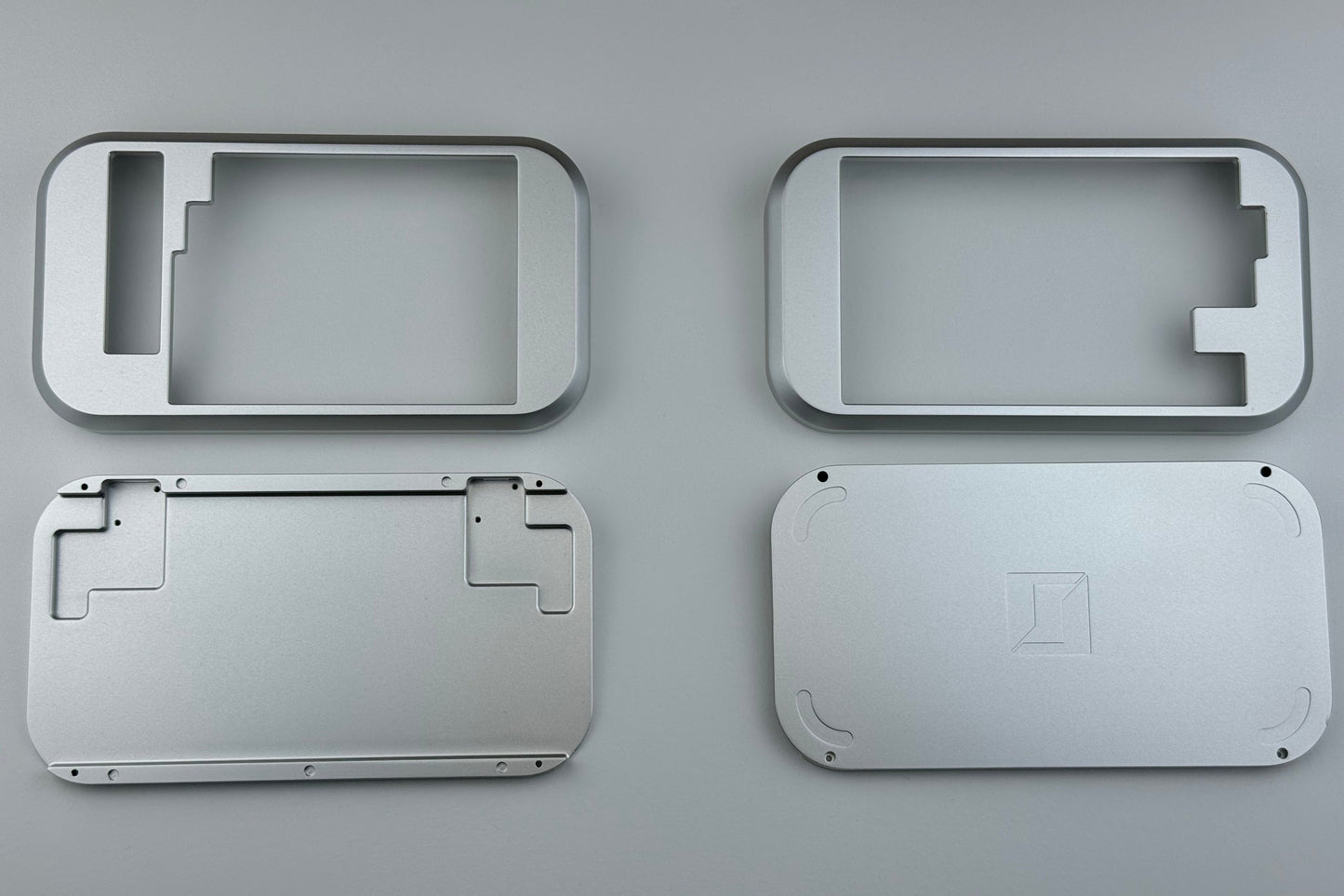 Top view of an opened silver Hall effect split keyboard, ortholinear layout for gaming