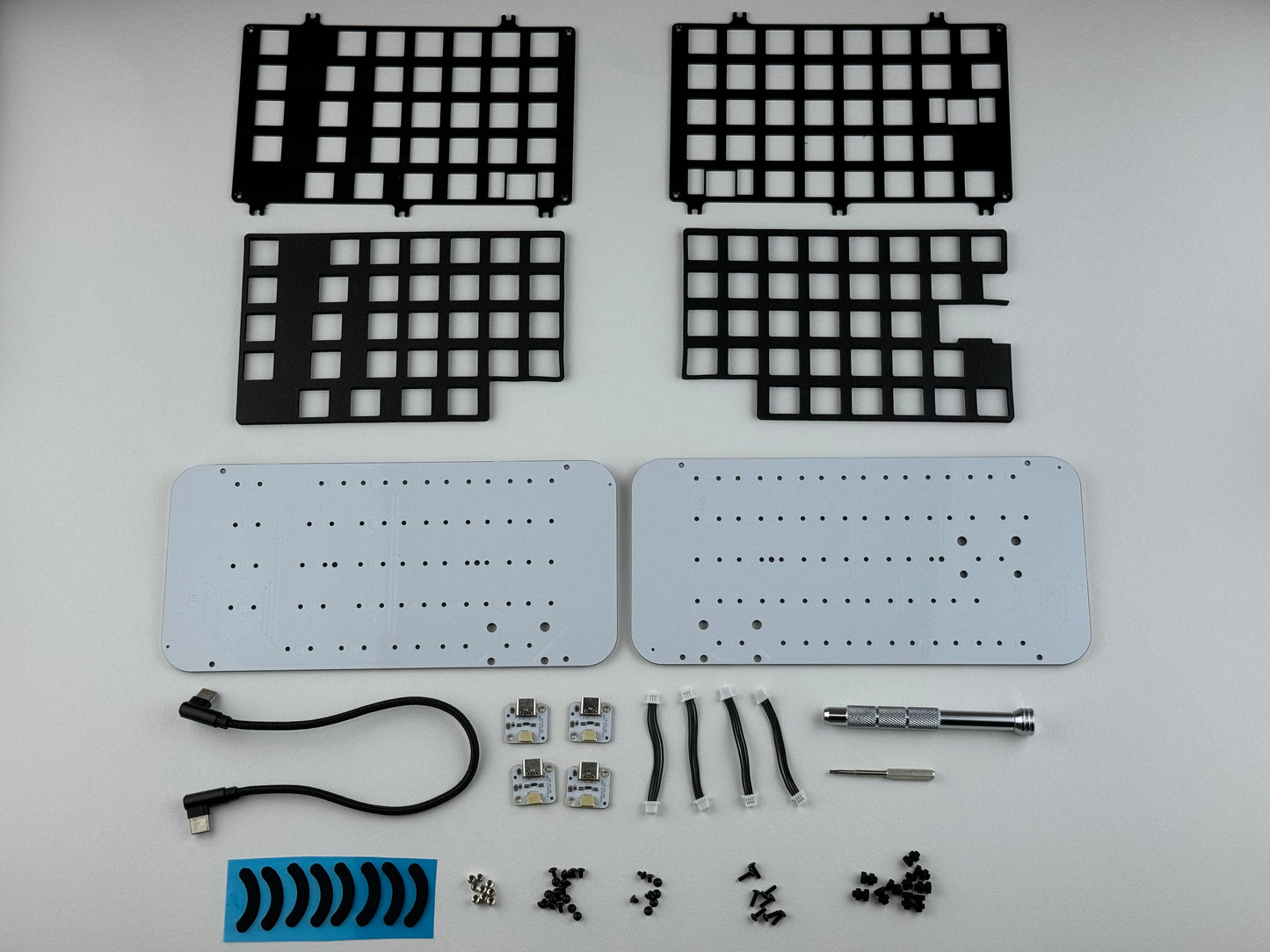 Top view of key components from a Hall effect split keyboard, ortholinear layout for gaming