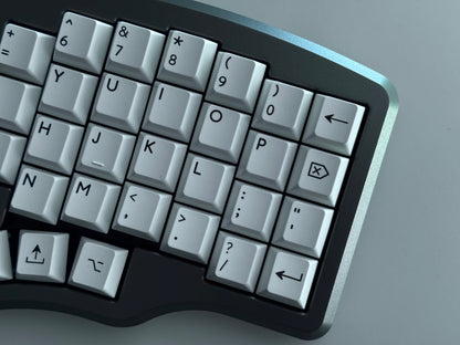 Top view of grey Hall effect split keyboard with 4x6 column staggered keys and 3 thumb keys white keycaps